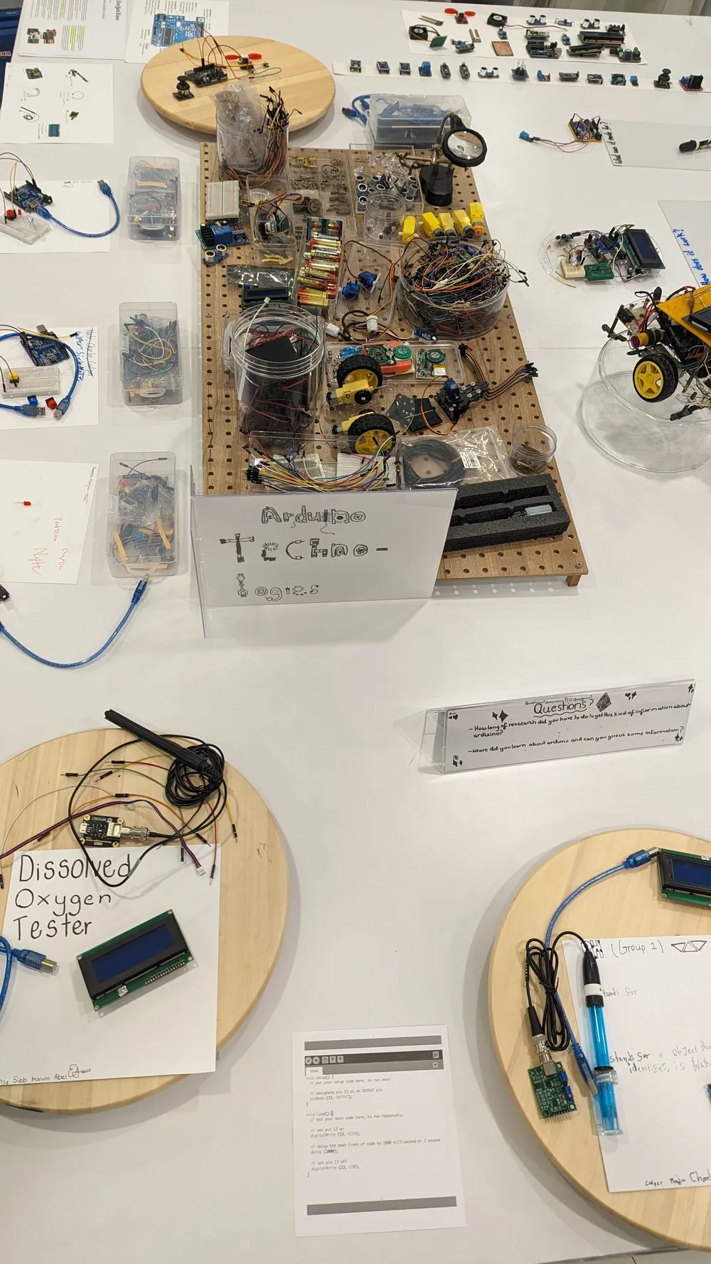 Deconstructed electronic components and circuit drawings on display